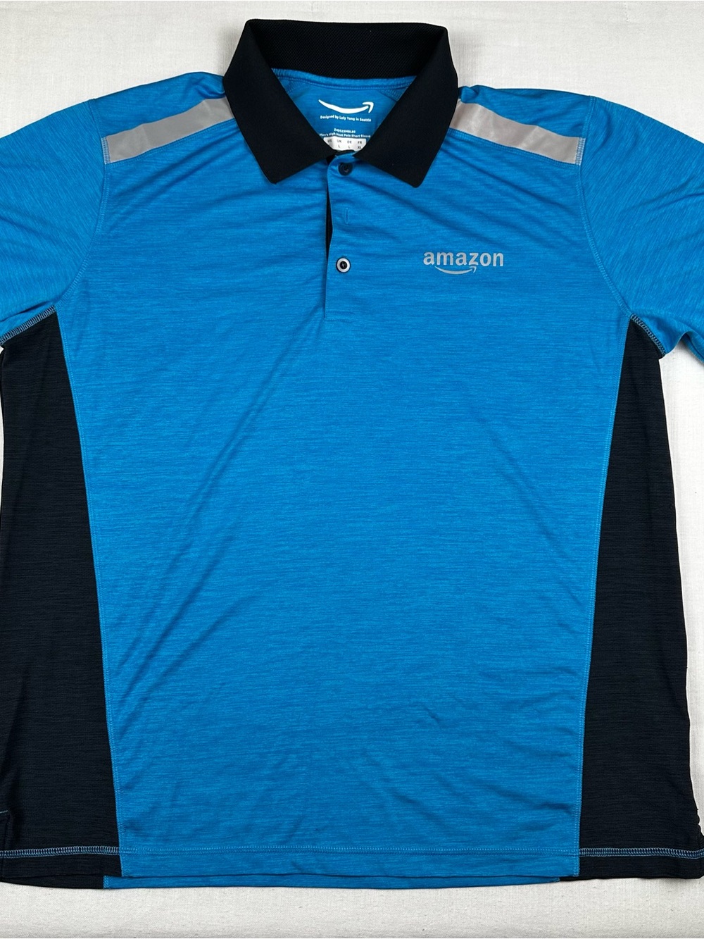 Amazon Men’s Bright Blue Polo with Black Collar and Side Panels
